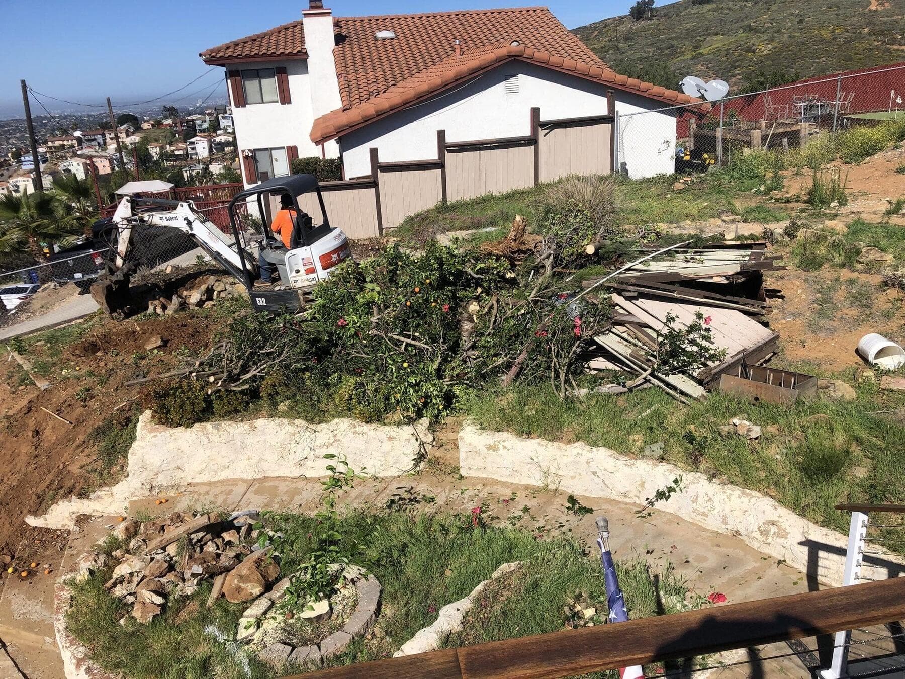 Old hillside walls opened up during demolition at Dictionary Hill