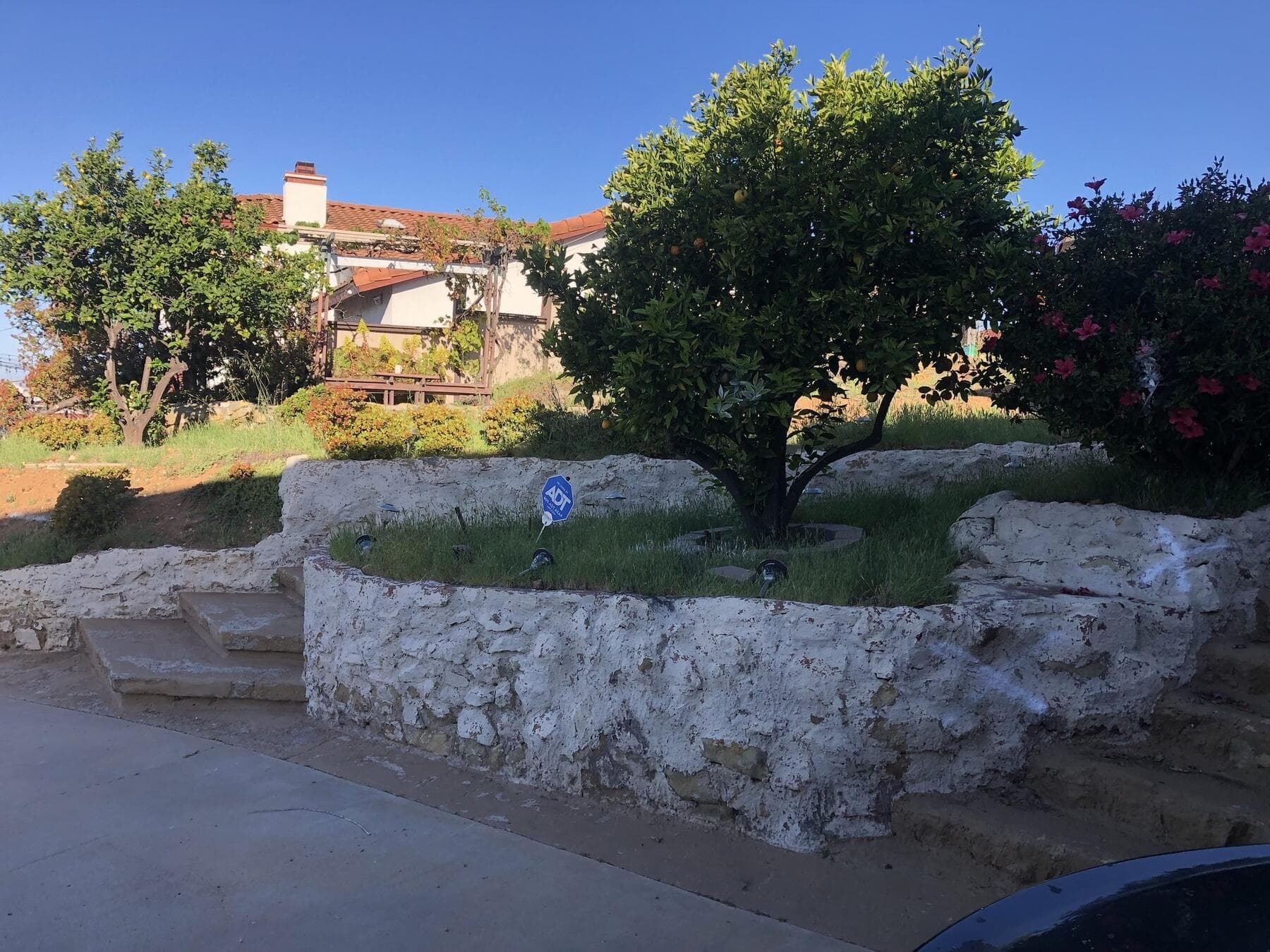 Old plastered stone walls and stairs at Dictionary Hill before demolition