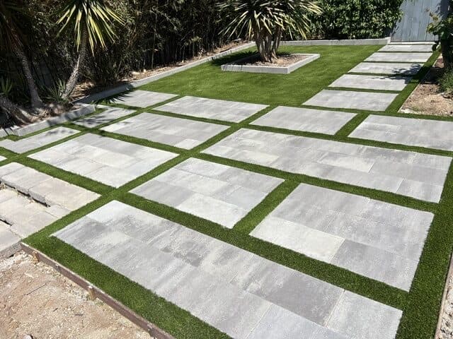 Large-format slabs with turf joints in a Pacific Beach yard