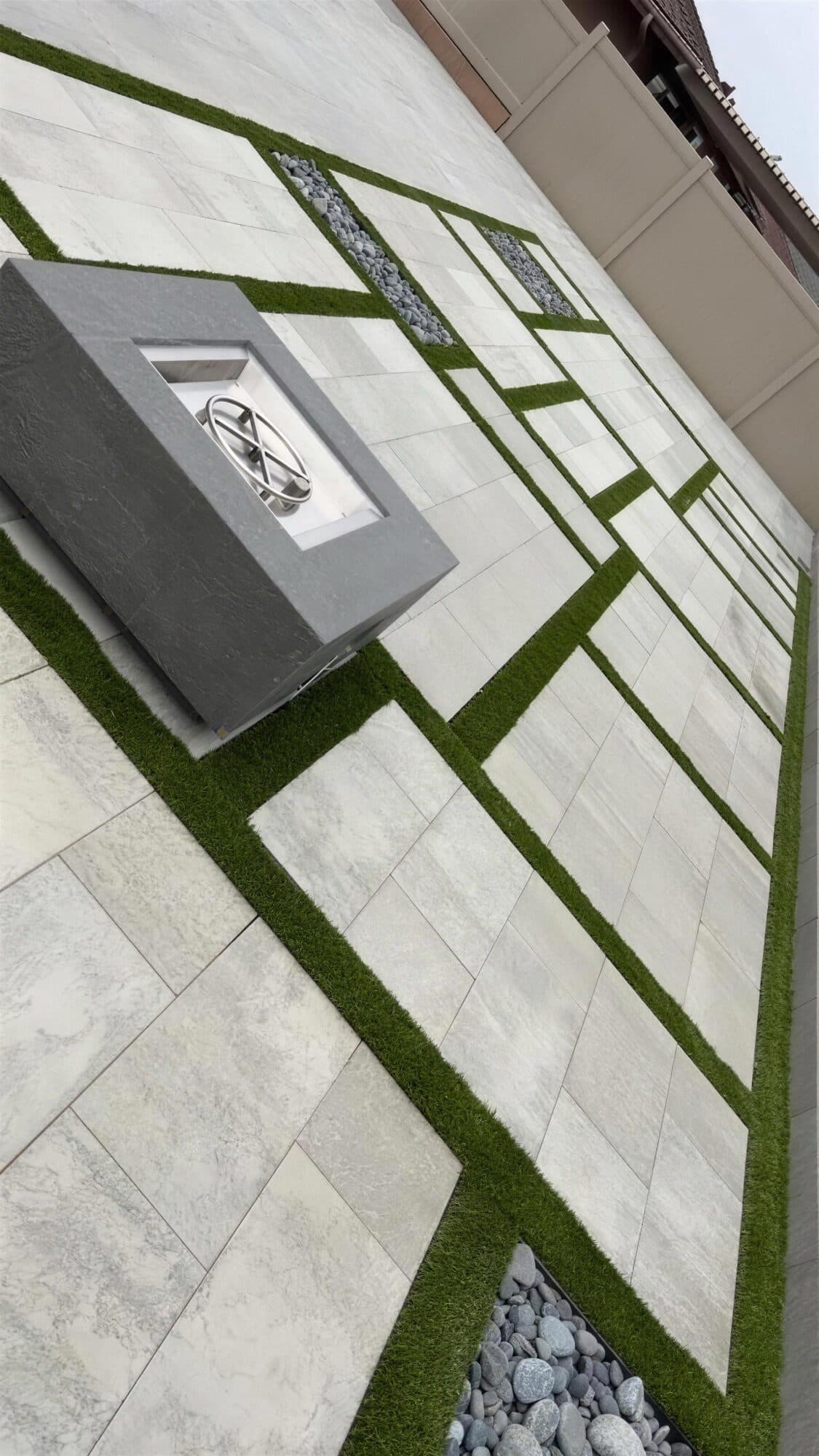 Concrete fire table on the slab and turf grid
